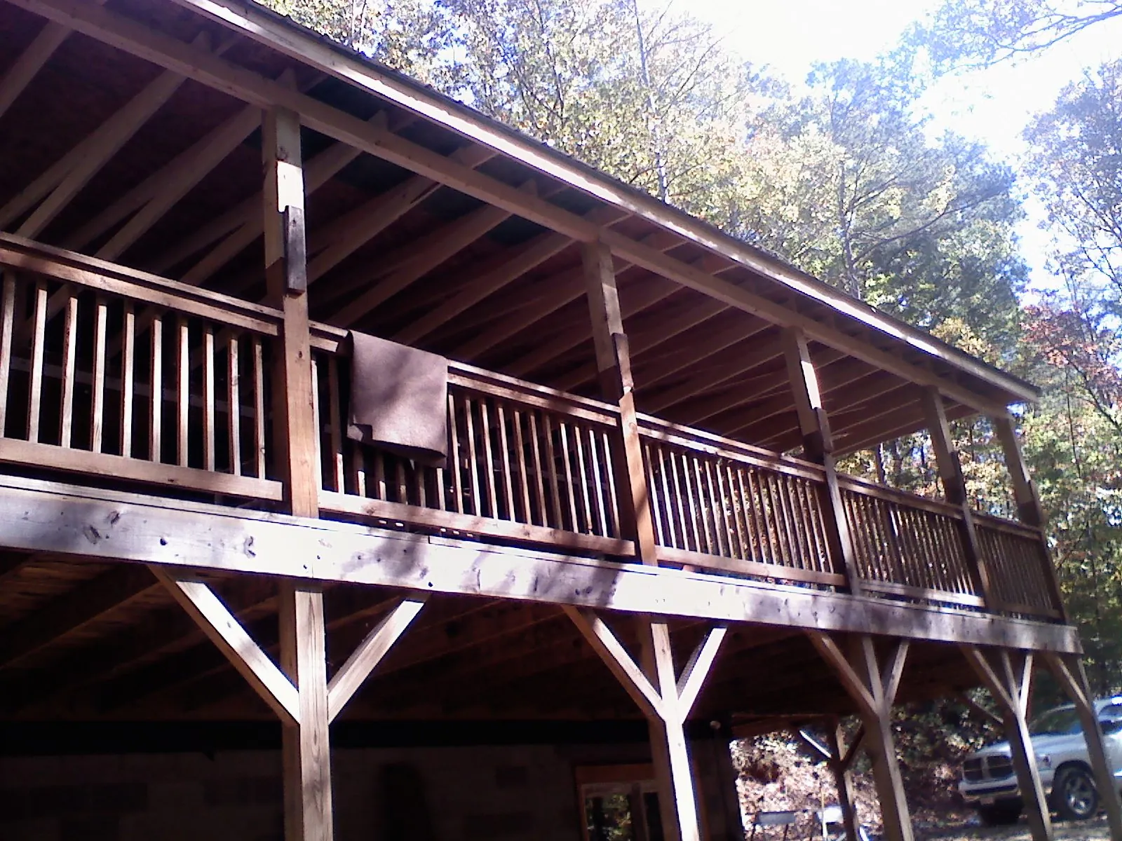 Timber framing under a new elevated porch and deck — Roof Leak Repair in Tennessee by Roofing Brothers